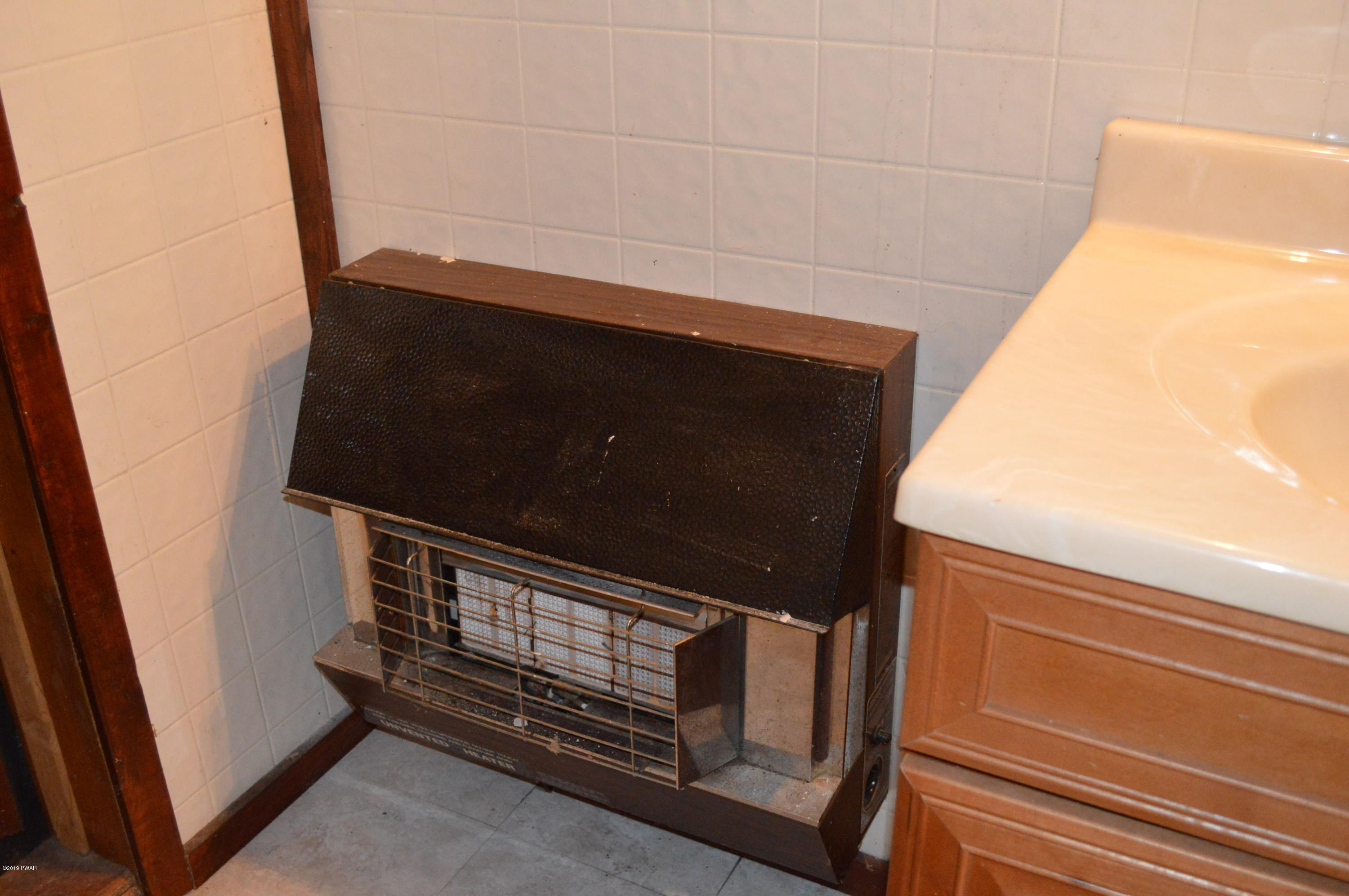 250 South Turnpike Road Newfoundland, PA 18445 - Photo 10 of 26 Heater in bathroom