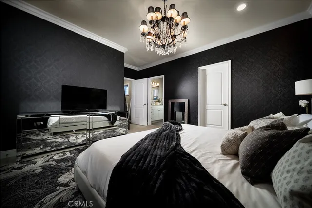 a bedroom with a bed and a cabinets