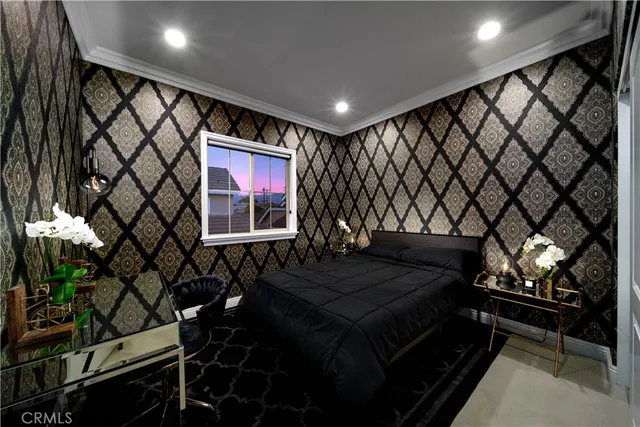 a bedroom with a bed and a book shelf