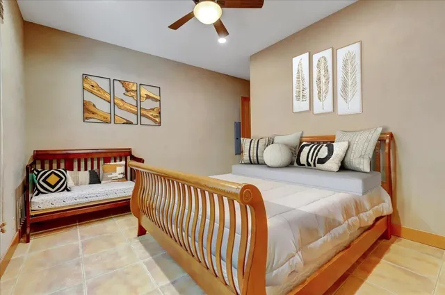 a kitchen with stainless steel appliances kitchen island granite countertop a stove a sink and a microwave