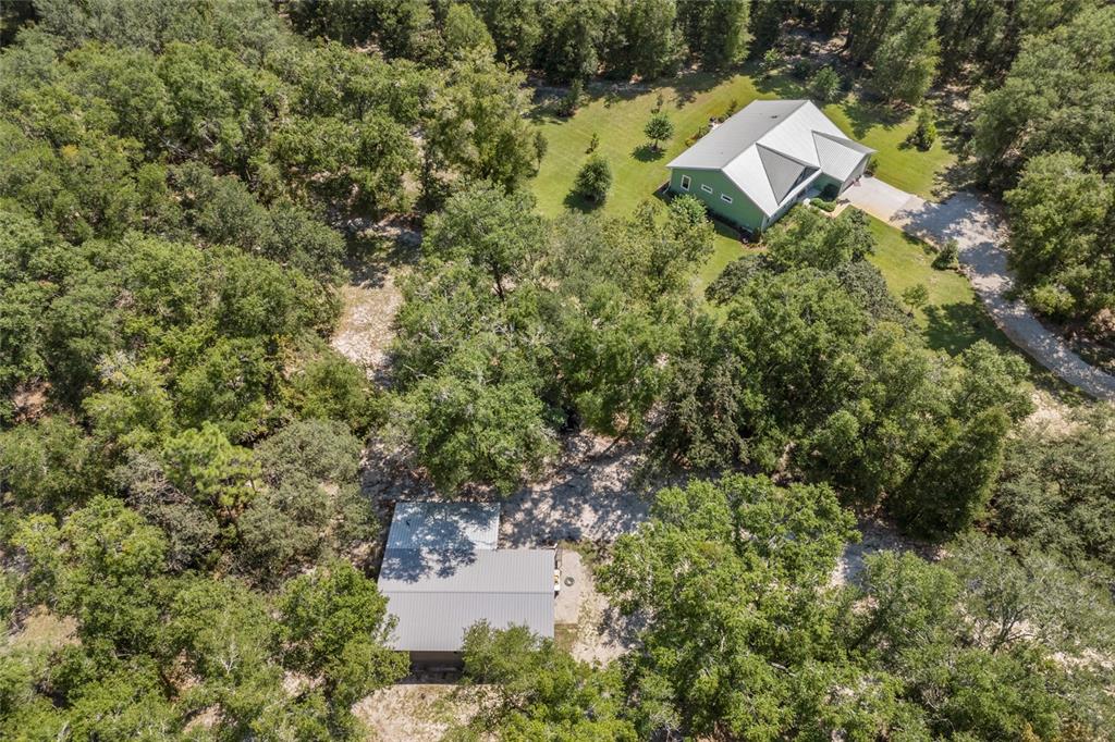 4162 Northeast 27th Lane High Springs, FL 32643 - Photo 40 of 46 a aerial view of a house with a yard