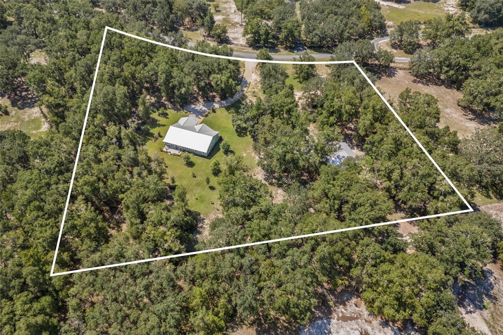 4162 Northeast 27th Lane High Springs, FL 32643 - Photo 45 of 46 a view of a yard and staircase