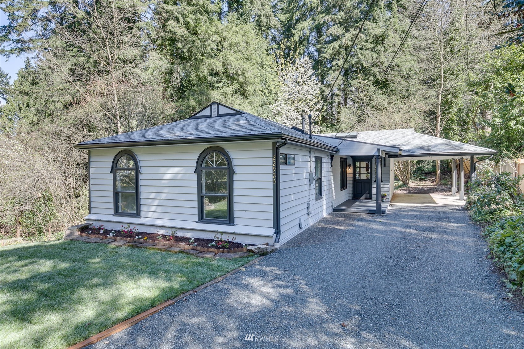 22925 2nd Avenue Southeast Bothell, WA 98021 - Photo 1 of 30 a front view of a house with garden