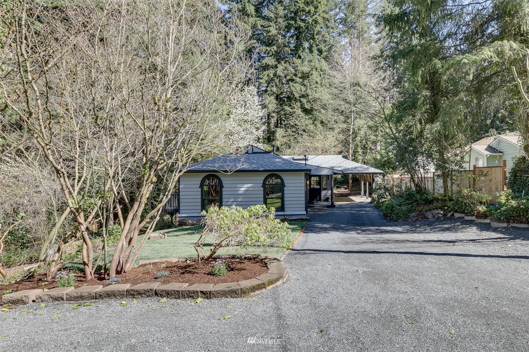 22925 2nd Avenue Southeast Bothell, WA 98021 - Photo 3 of 30 a front view of a house with a yard and garage