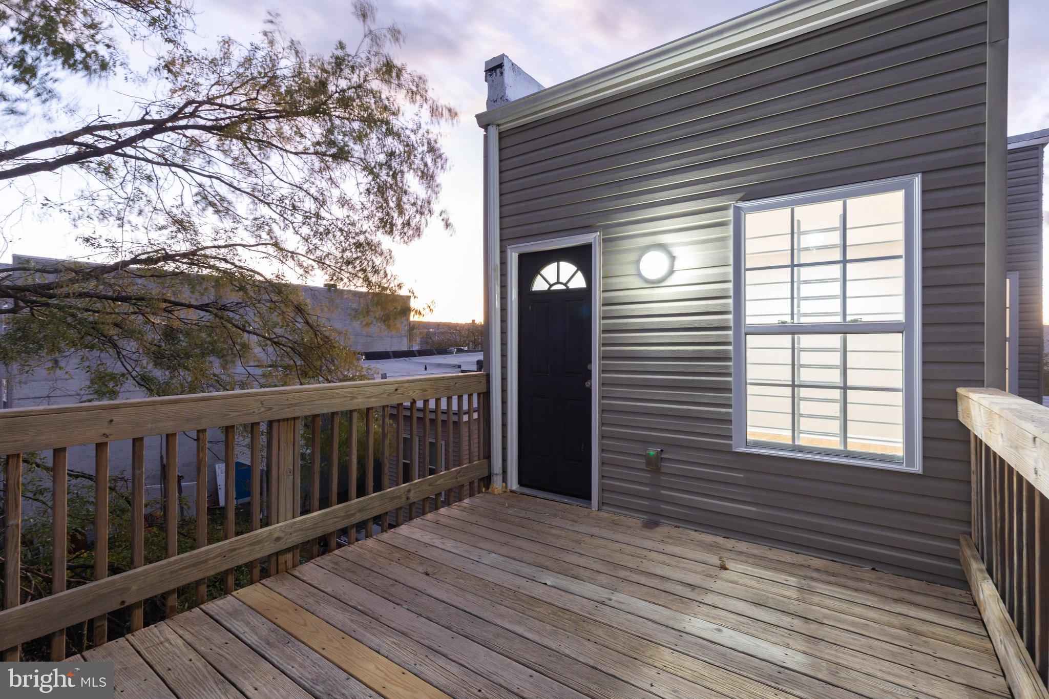 1931 North Uber Street, Unit 2 Philadelphia, PA 19121 - Photo 20 of 26 a view of a wooden deck