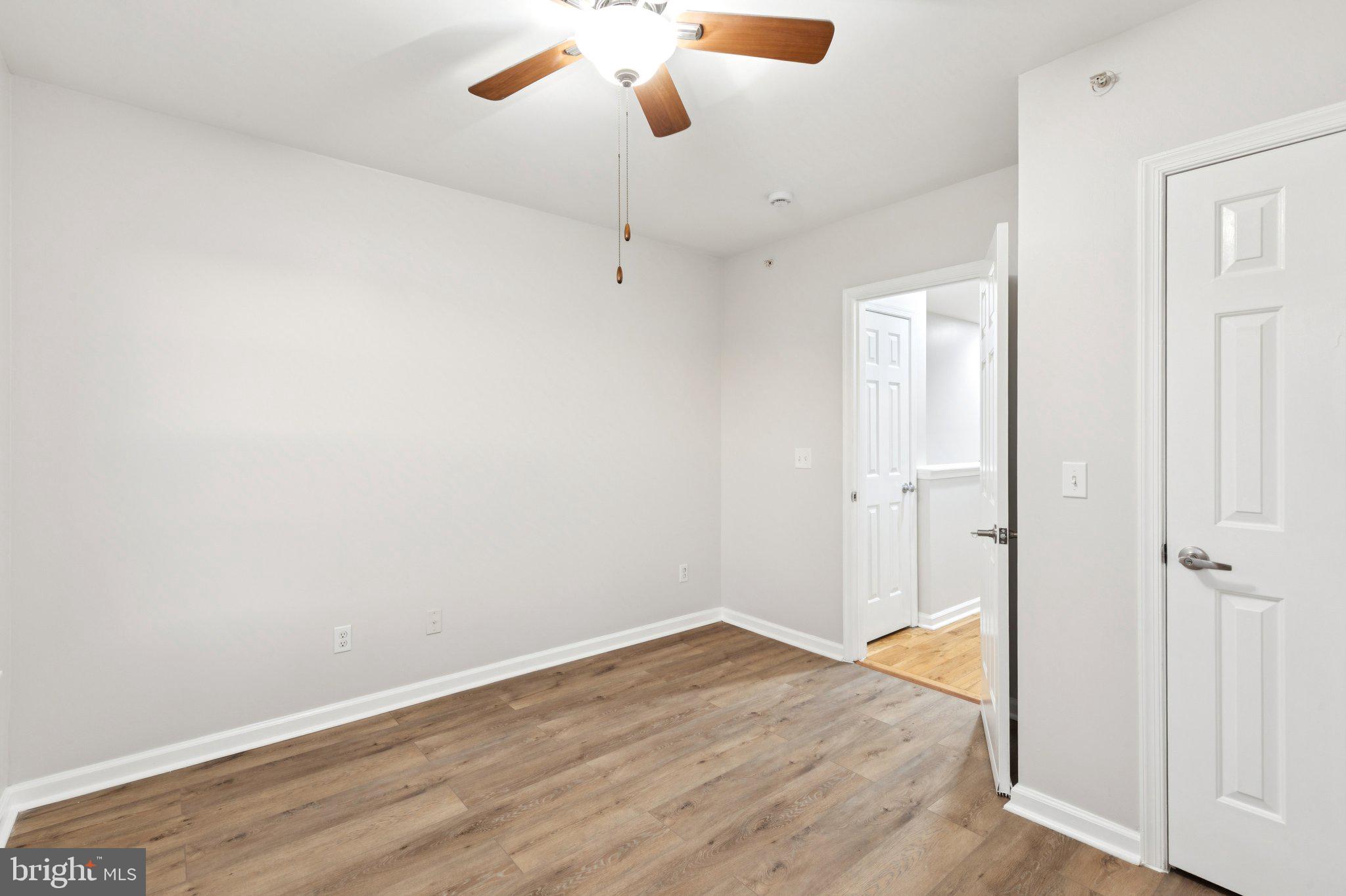 1931 North Uber Street, Unit 2 Philadelphia, PA 19121 - Photo 22 of 26 wooden floor in an empty room