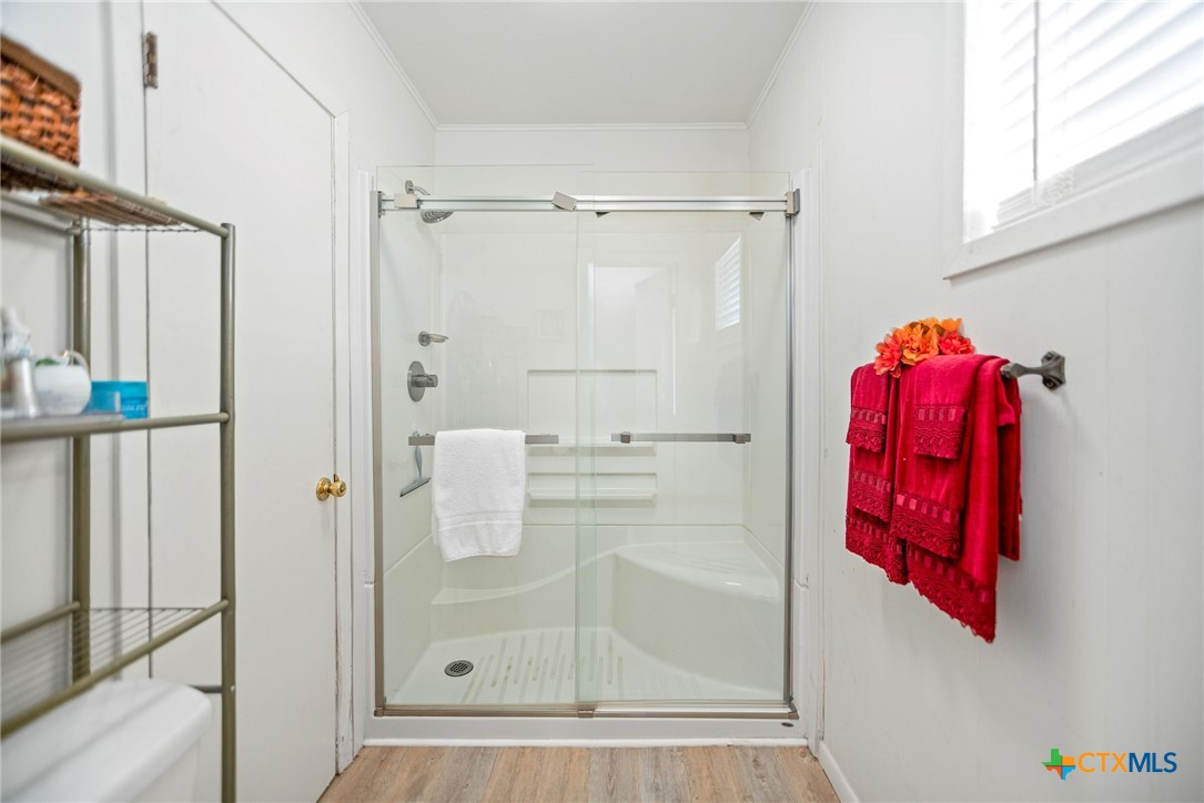 207 Williams Street Tivoli, TX 77990 - Photo 19 of 32 a bathroom with a shower