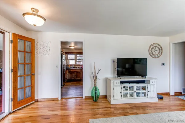 a view of living room with furniture and flat screen tv