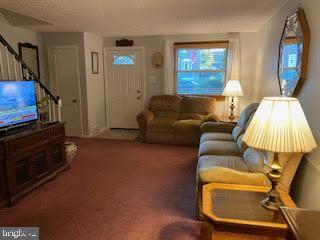 743 Bennington Road Folcroft, PA 19032 - Photo 4 of 22 a living room with furniture and a flat screen tv