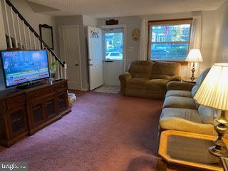 743 Bennington Road Folcroft, PA 19032 - Photo 5 of 22 a living room with furniture and a window