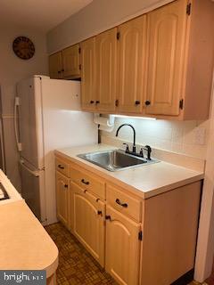 743 Bennington Road Folcroft, PA 19032 - Photo 9 of 22 a kitchen with appliances a sink and cabinets