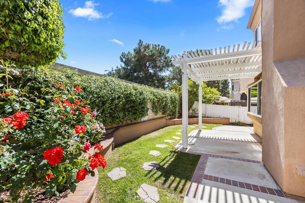 6 Aprilla Irvine, CA 92614 - Photo 25 of 37 Private rear yard with covered patio