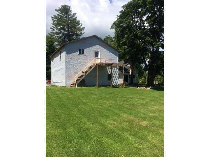 101 Rocky Dun Road West Baldwin, ME 04091 - Photo 9 of 10 Garage. siding and deck needs to be...