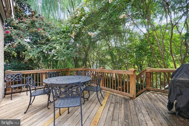 a view of a chairs and table on the wooden floor