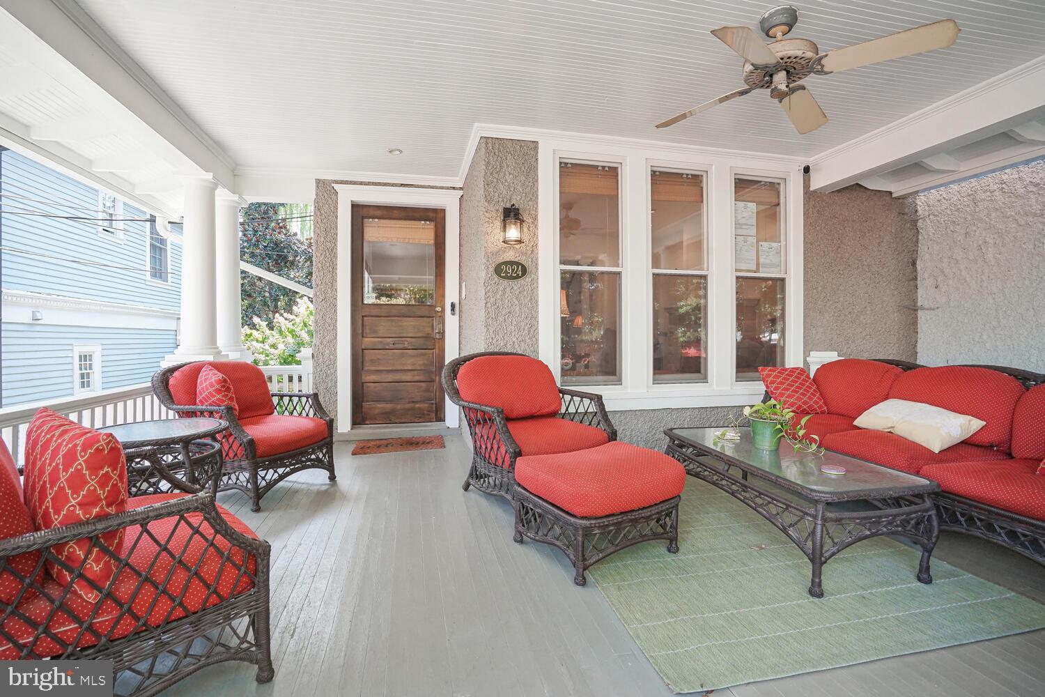 2924 Newark Street Northwest Washington, DC 20008 - Photo 2 of 26 a living room with furniture a rug and a large window