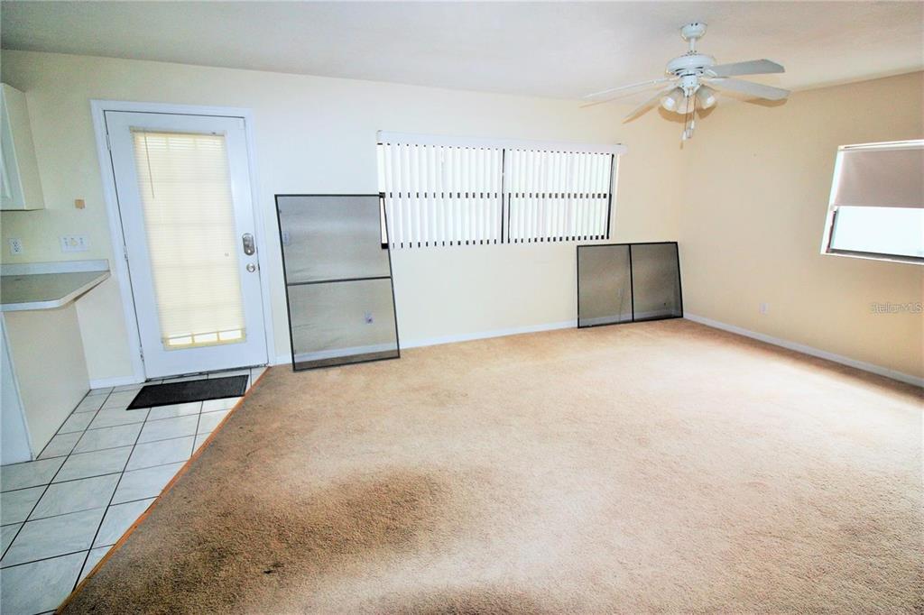 521 20th Street Southwest, Unit C Winter Haven, FL 33880 - Photo 6 of 18 a view of a livingroom with an empty space