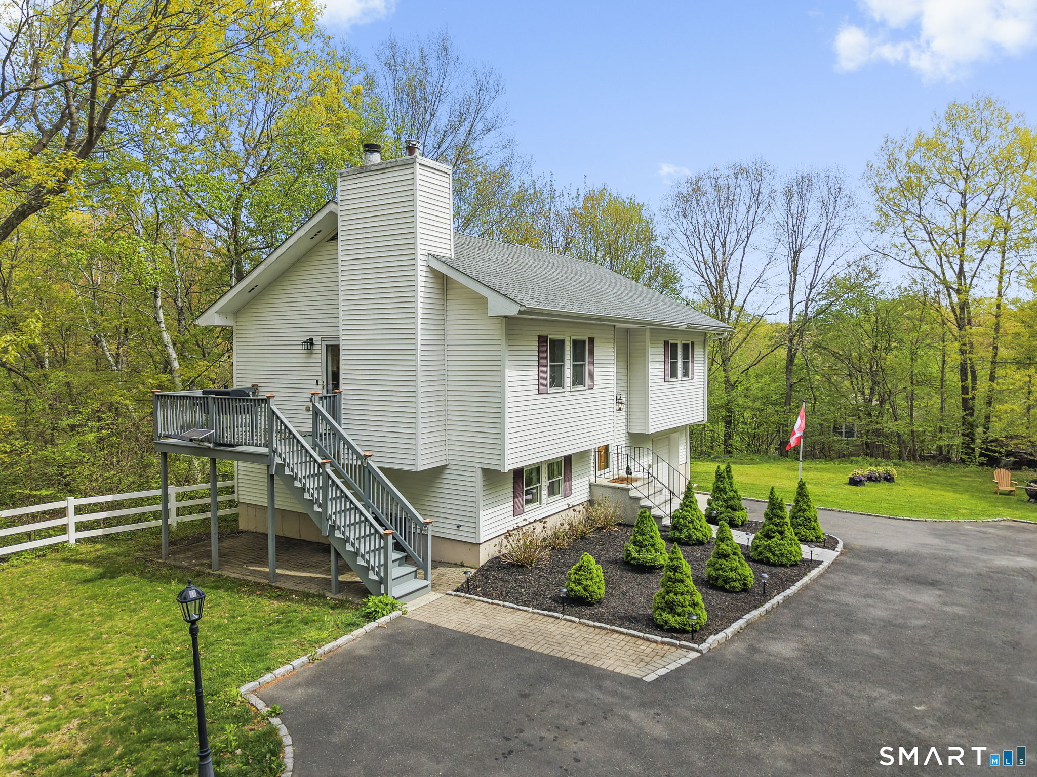 1118 Spindle Hill Road Wolcott, CT 06716 - Photo 8 of 38 a front view of a house with a yard