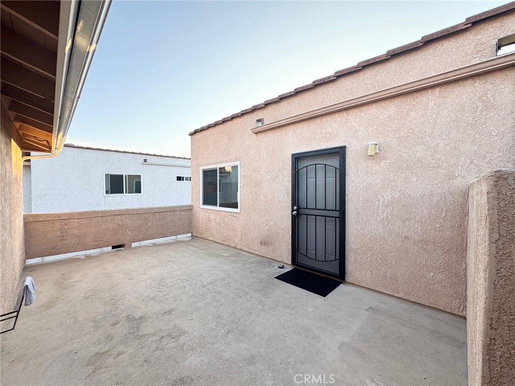 17511 Newland Street, Unit D Huntington Beach, CA 92647 - Photo 2 of 15 a view of an empty room with closet