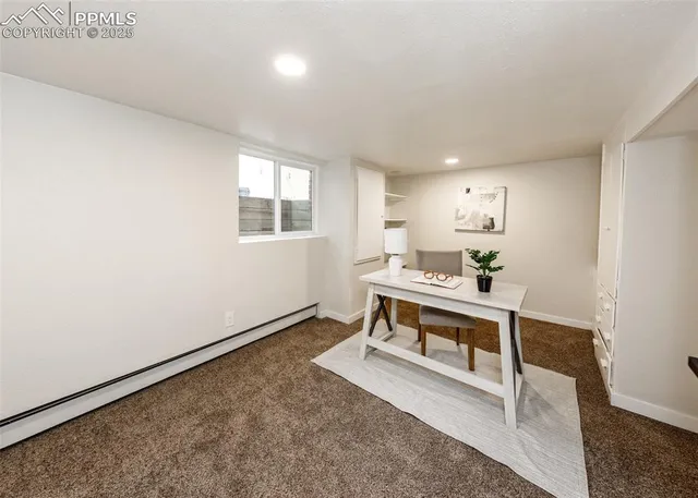 a room with furniture a window and a table