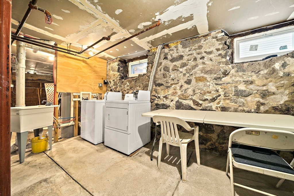 742 River Street, Unit 1 Boston, MA 02136 - Photo 12 of 17 a view of a patio with table and chairs