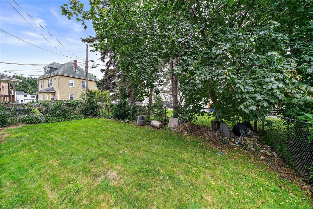 742 River Street, Unit 1 Boston, MA 02136 - Photo 14 of 17 a view of a house with a yard