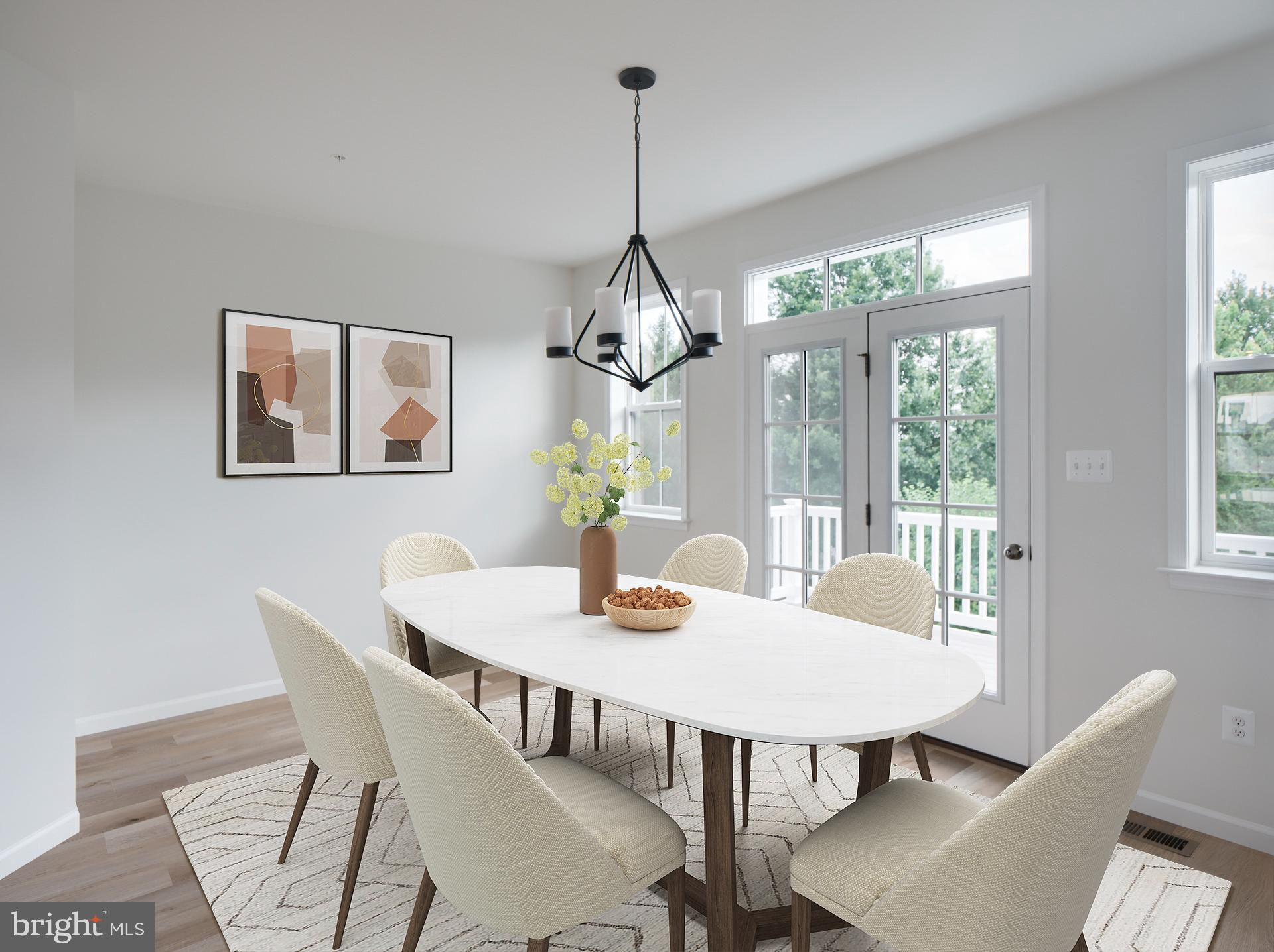 2617 Front Shed Drive Frederick, MD 21702 - Photo 3 of 77 a dining room with furniture a chandelier and wooden floor