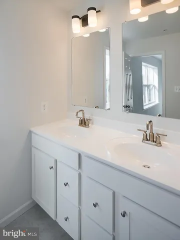 a view of a dining room with furniture and window