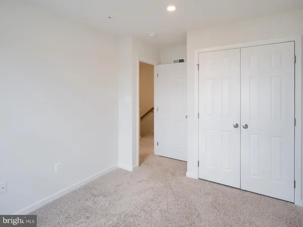 a living room with furniture fireplace and flat screen tv