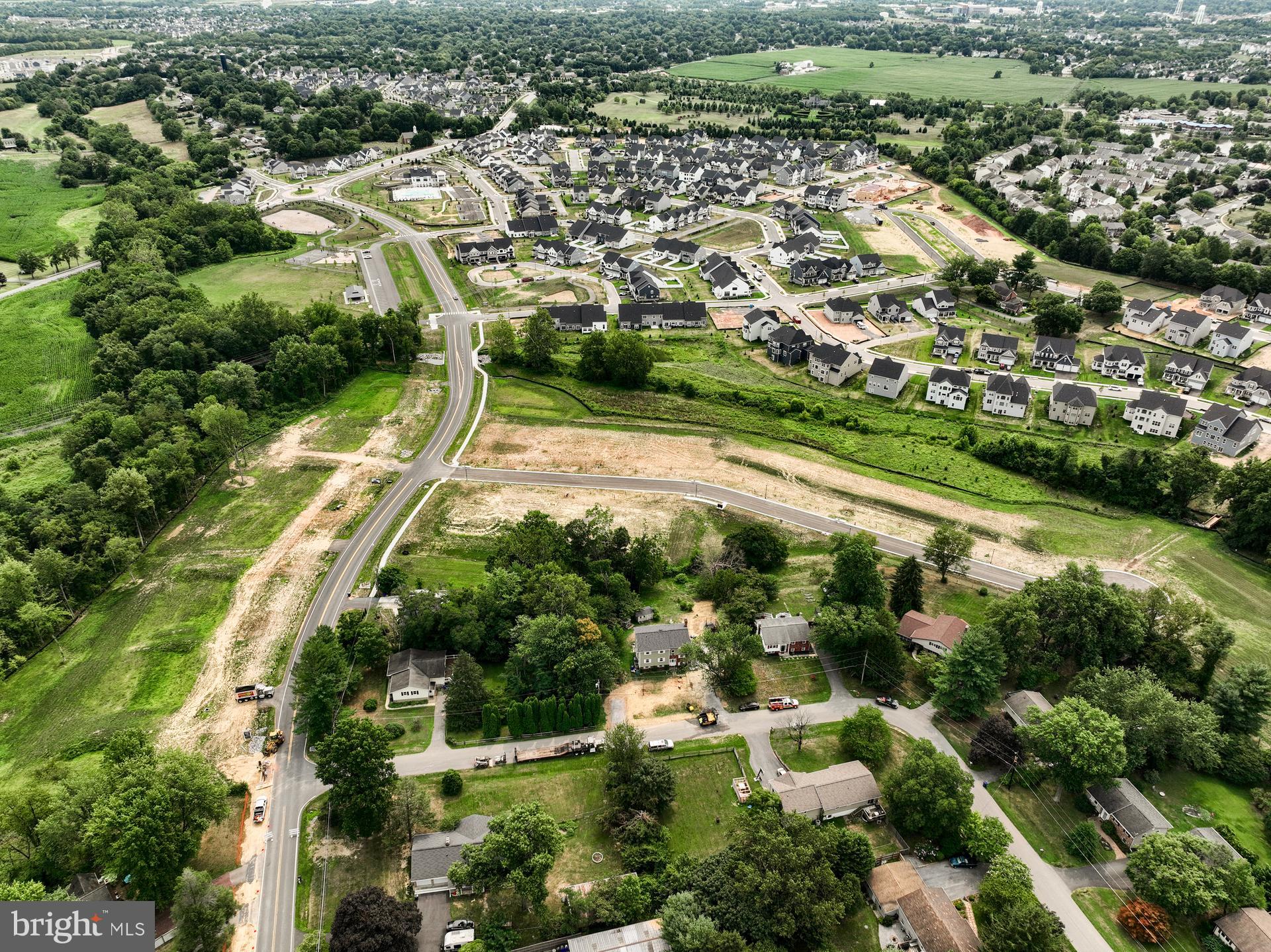 2617 Front Shed Drive Frederick, MD 21702 - Photo 76 of 77 an aerial view of residential houses with outdoor space and trees