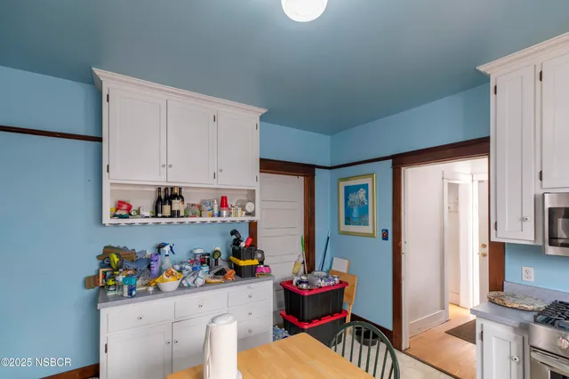 a view of a storage & utility room with toys