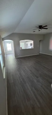 a view of a livingroom with furniture