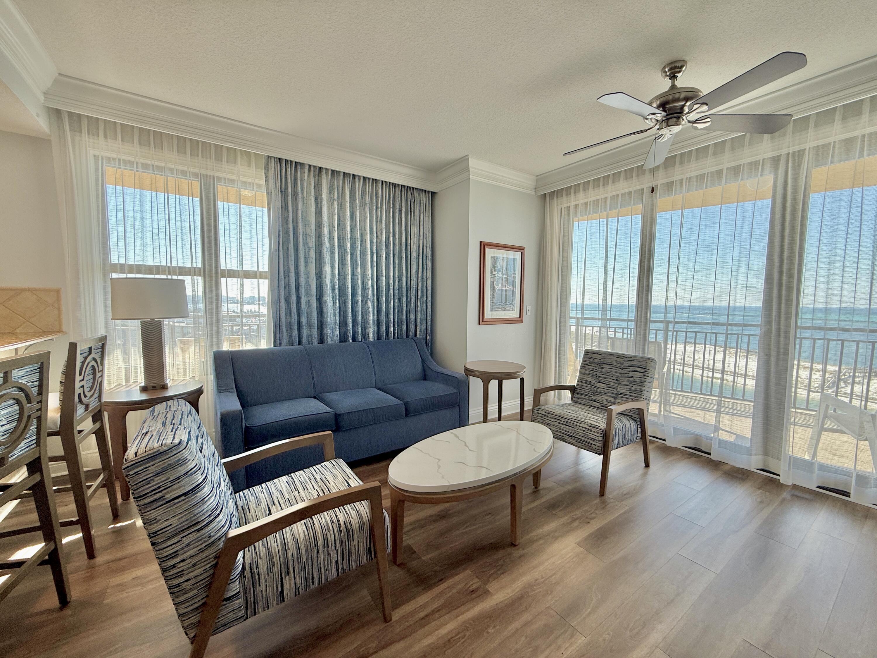 10 Harbor Boulevard, Unit E506F Destin, FL 32541 - Photo 3 of 33 a living room with furniture and a window