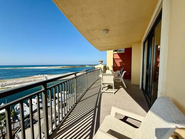 a view of balcony with couch and wooden floor