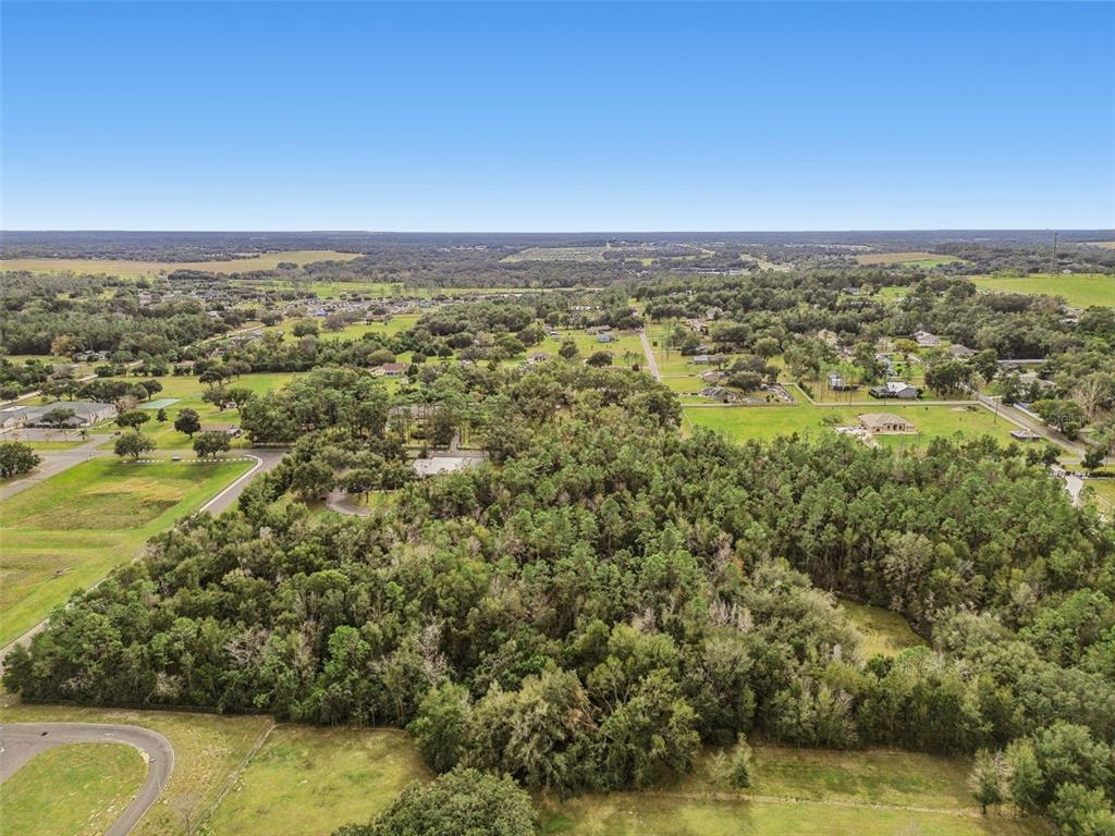 Centennial Road Dade City, FL 33525 - Photo 11 of 21 an aerial view of residential houses with outdoor space and seating