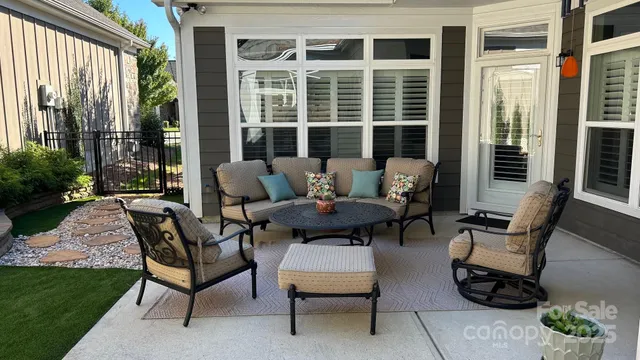 a outdoor living space with furniture and a garden