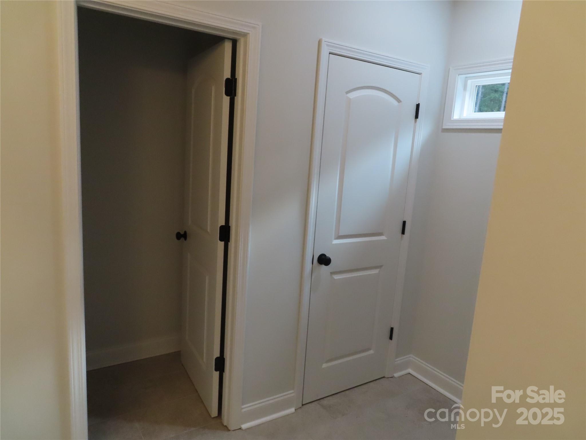 2099 Cedar Road York, SC 29745 - Photo 22 of 37 a bathroom with a glass shower door
