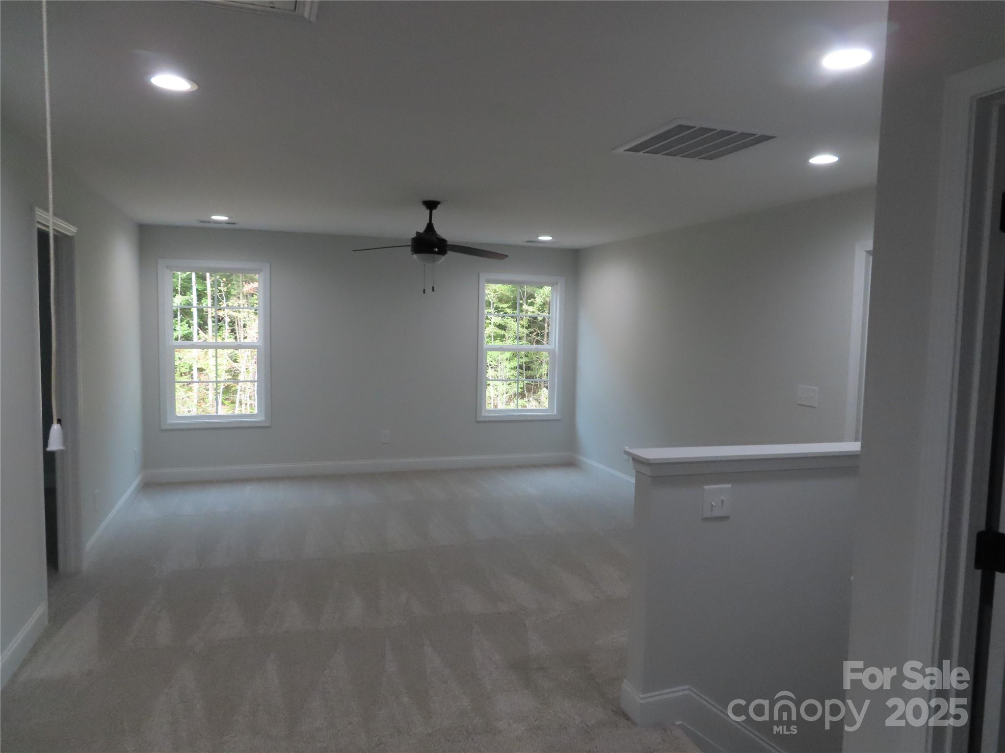 2099 Cedar Road York, SC 29745 - Photo 29 of 37 an empty room with windows and closet