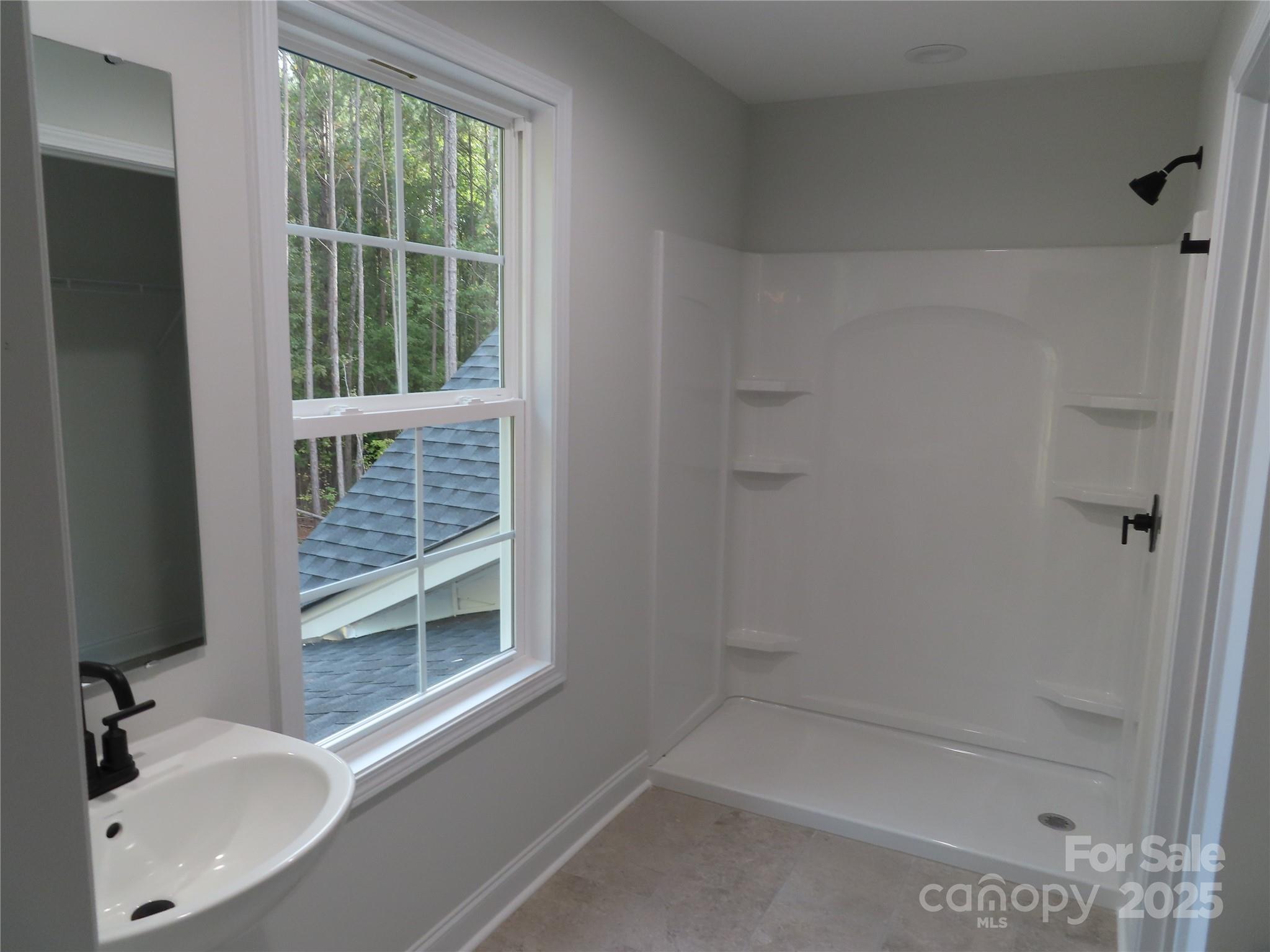 2099 Cedar Road York, SC 29745 - Photo 34 of 37 a bathroom with a granite countertop sink toilet and shower
