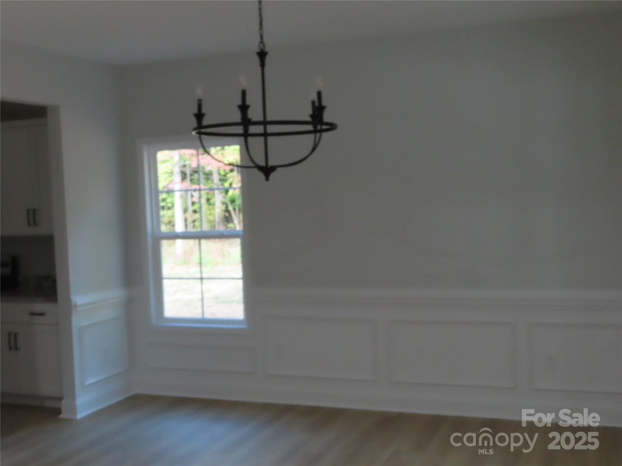 2099 Cedar Road York, SC 29745 - Photo 10 of 37 a empty room with a window and a ceiling fan