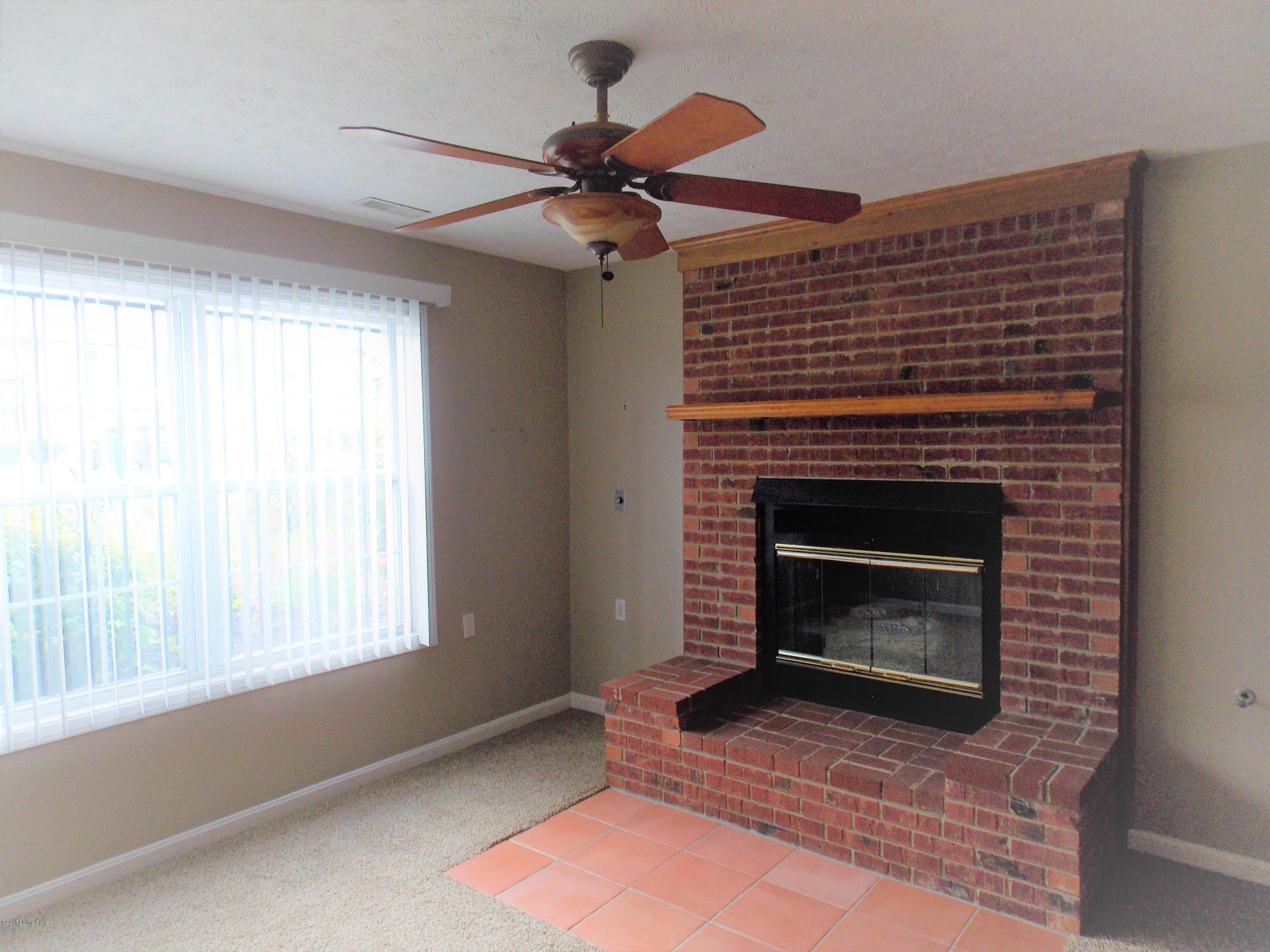 7306 Ridge Creek Road Louisville, KY 40291 - Photo 4 of 53 Family Room in basement with gas fireplace