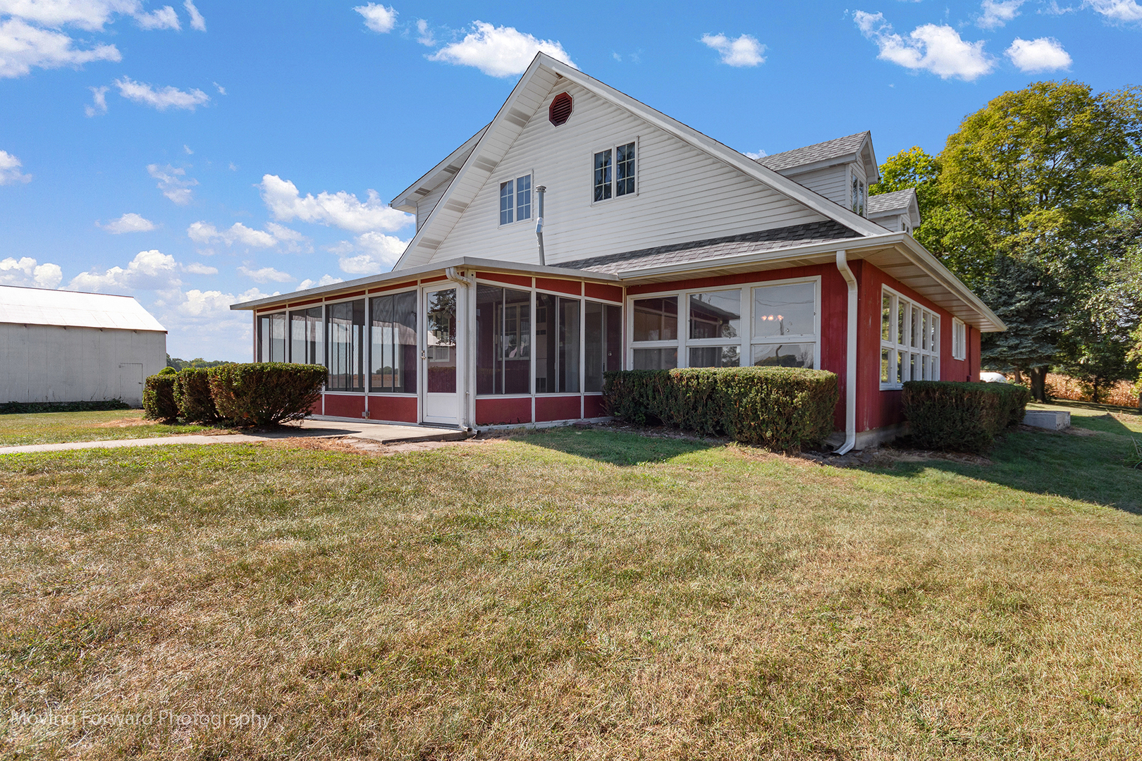 1645 East Southmor Road Morris, IL 60450 - Photo 1 of 39 a view of a house with a yard and potted plants