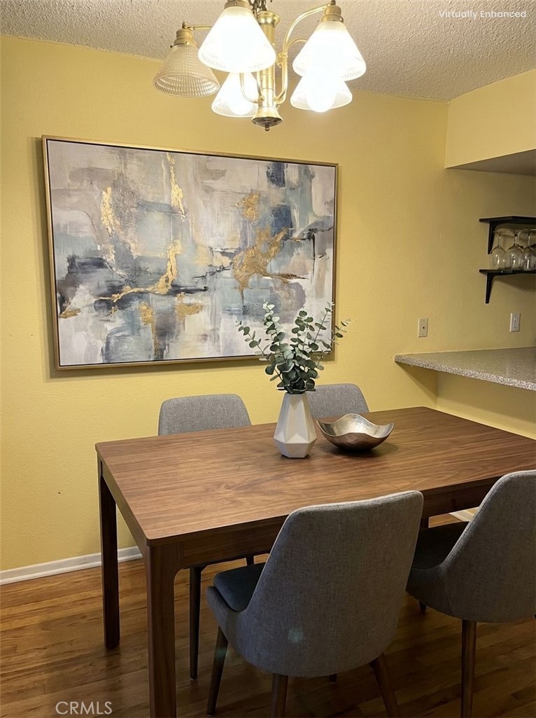 2891 Canyon Crest Drive, Unit 53 Riverside, CA 92507 - Photo 4 of 6 After staging dining room