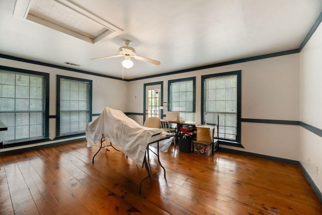 9875 Old Bridge Road Terrell, TX 75160 - Photo 24 of 40 a living room with furniture and wooden floor