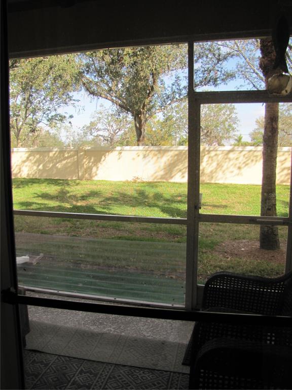 3461 Parkridge Circle, Unit 18104 Sarasota, FL 34243 - Photo 12 of 35 a view of a glass door