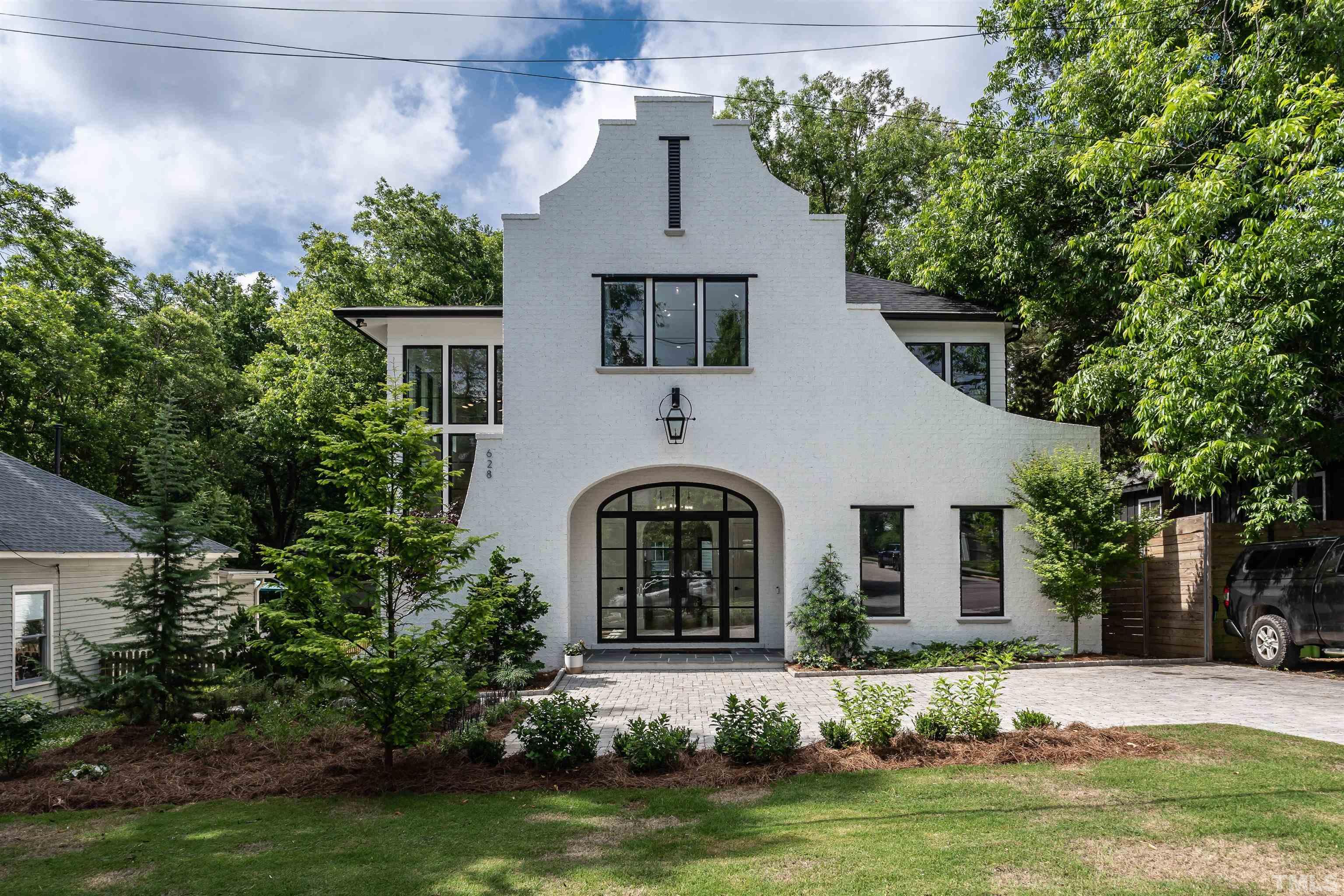 628 Sasser Street Raleigh, NC 27604 - Photo 1 of 45 front view of a house with a yard