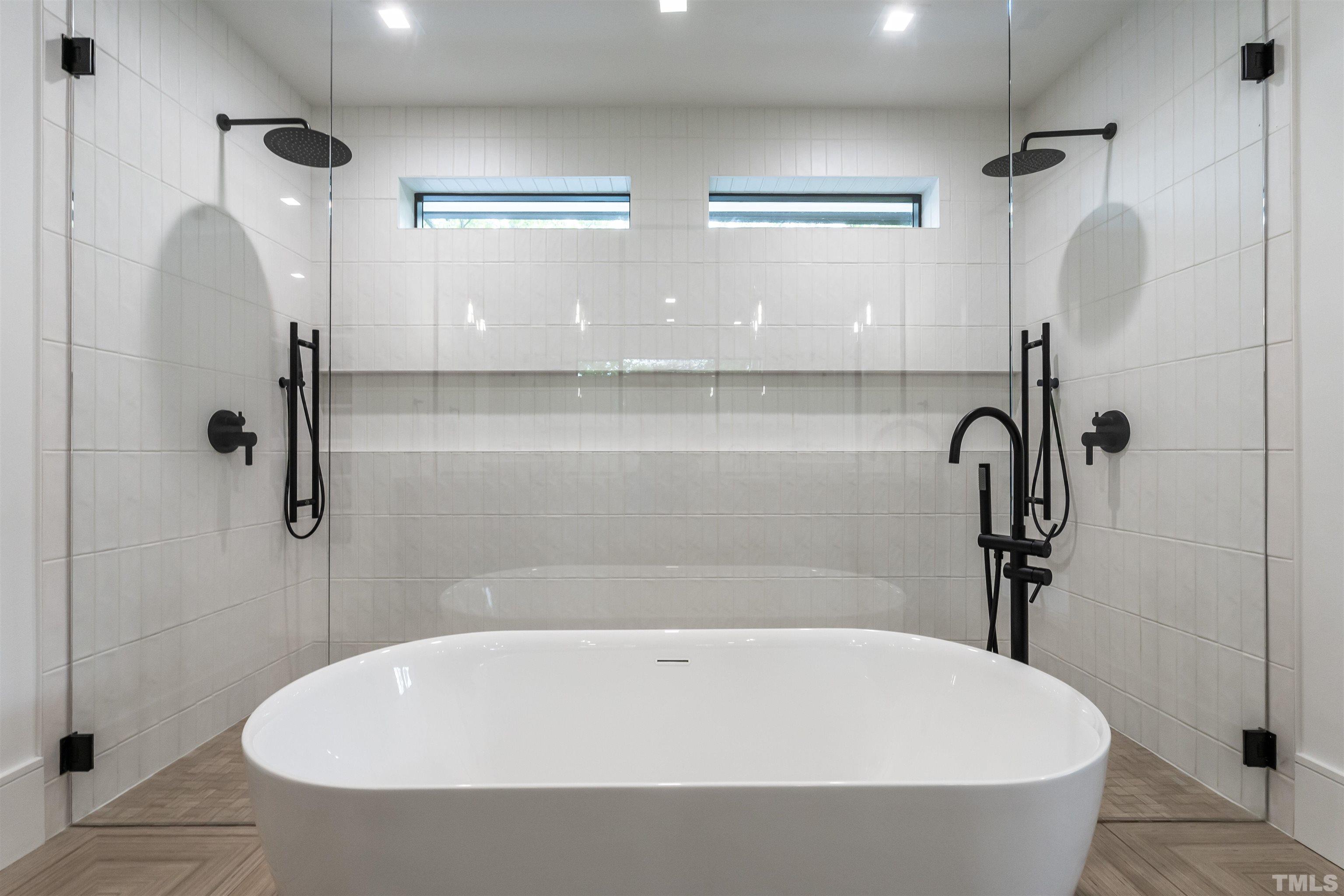 628 Sasser Street Raleigh, NC 27604 - Photo 32 of 45 a bathroom with a white bath tub