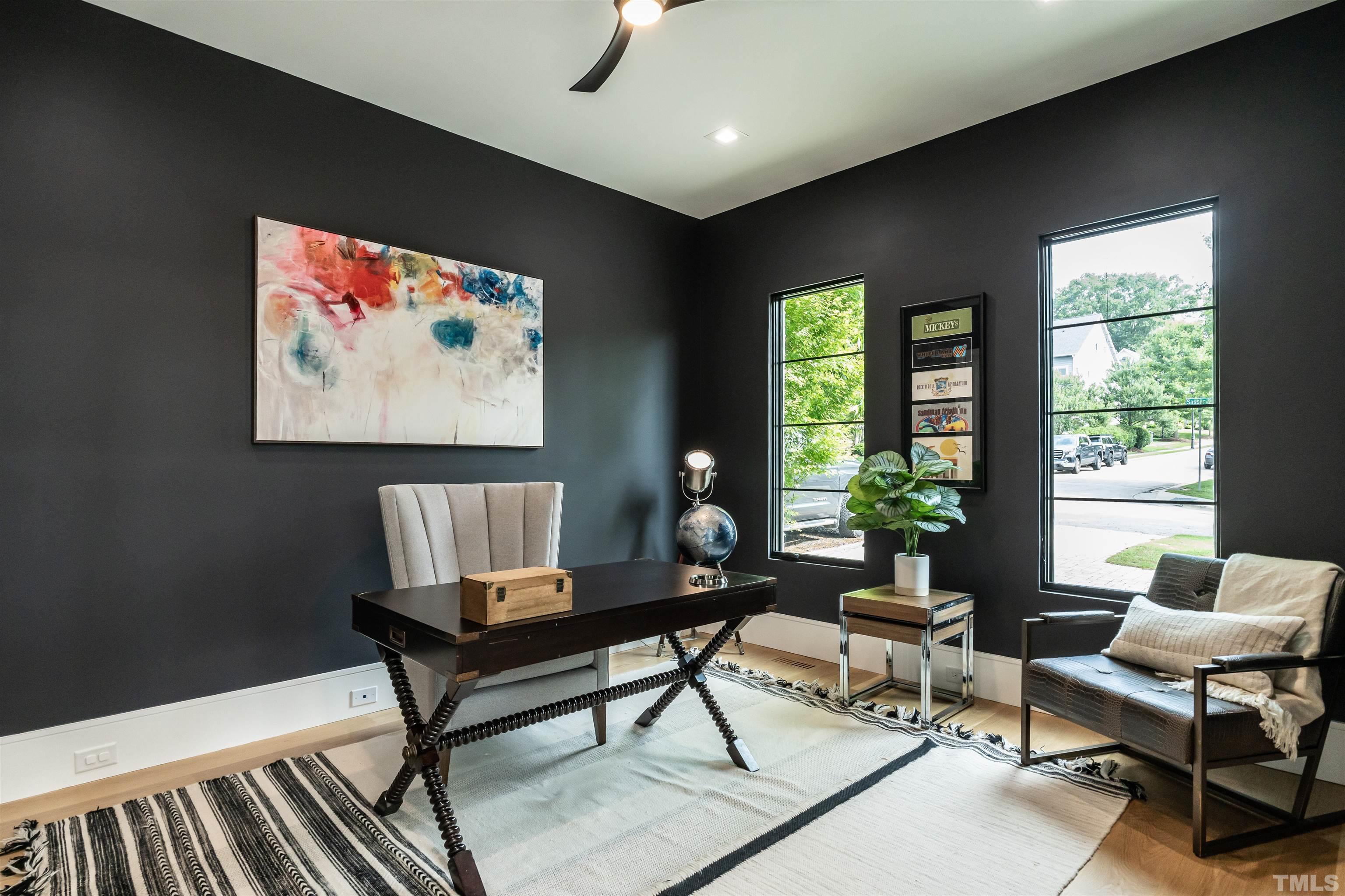628 Sasser Street Raleigh, NC 27604 - Photo 6 of 45 a living room with furniture and a potted plant