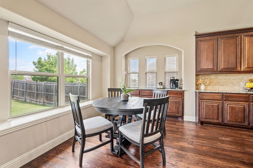 5209 Edgebrook Way Fort Worth, TX 76244 - Photo 12 of 33 a view of a dining room with furniture window and wooden floor