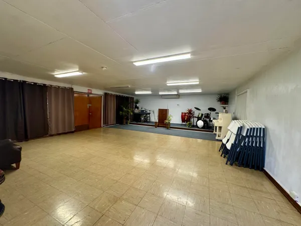 a room with furniture and a large window