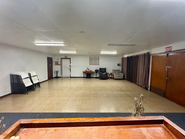 a view of kitchen and refrigerator